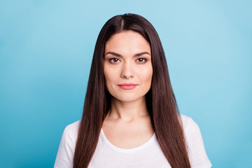 Closeup photo of charming cute mature intelligent clever woman staring at camera while isolated with blue background