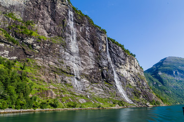 View on the famous high waterfall Seven sisters in Gerianger fjord in More og Romsdal county in Norway