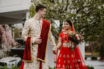 Happy brides Hindu people are walking and enjoying their wedding day