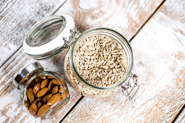 jars of raw almond and sunflower seeds