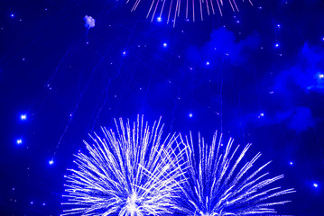 Blue fireworks in the night sky