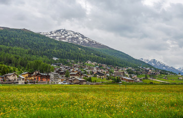 LIVIGNO, ITALY, JUNE 21 2019 - Summer view of Livigno, an Italian town in the province of Sondrio in Lombardy and renowned winter and summer tourist resort in the Alps, Italy.