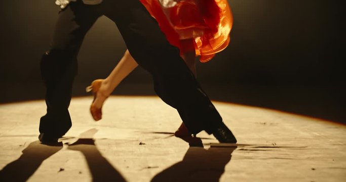 Teen asian kids performing ballroom sport dance on stage with smoked black background on way of becoming professional choreographers - childhood dream, childhood memories concept 4k footage