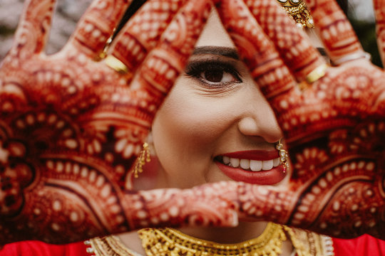 Portrait Of Smiling Indian Bride On Wedding Day