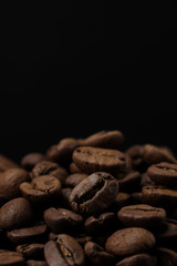 roasted coffee beans background close up. macro shot
