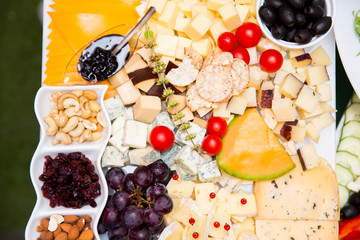 bites of fresh fruit, cheese and nuts