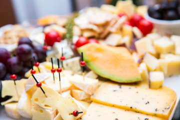 bites of fresh fruit, cheese and nuts