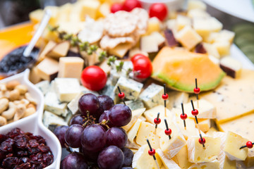 bites of fresh fruit, cheese and nuts