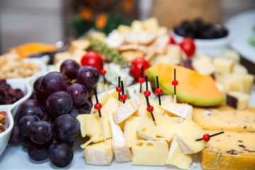 bites of fresh fruit, cheese and nuts