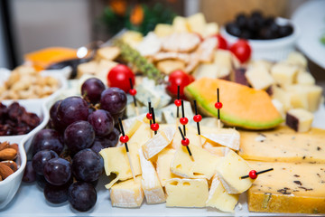 bites of fresh fruit, cheese and nuts