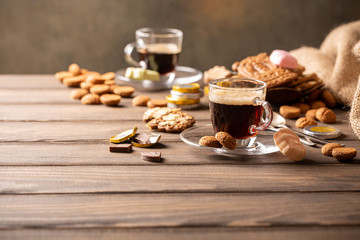 Cup of coffee with traditional sweets for Dutch holiday Sinterklaas, festive breakfast, st. Nicolas day concept. Copy space.