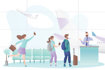 Airport interior and queue of tourists with luggage,male flight attendant behind the check-in counter