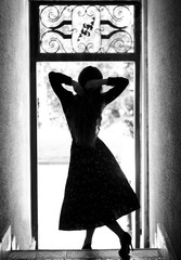 Silhouette of dancing girl in coridor .Black and white