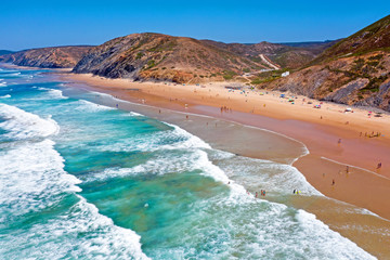 Aerial from Vale Figueiras beach on a beautiful summer day in Portugal
