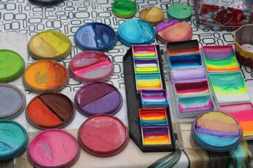 palette with paints and brushes