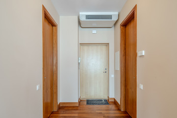 View of the entrance door in modern apartment.