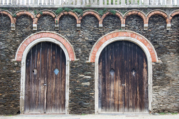 Fototapeta na wymiar Ancient wooden door, old wooden doors of european building background.