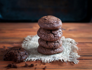 Close-up of homemade chocolate cookies on wooden background