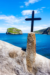LANDSCAPE WITH CROSS IN THE FIRST PLANE AND GREAT ROCK IN THE HORIZON WITH BLUE SKY