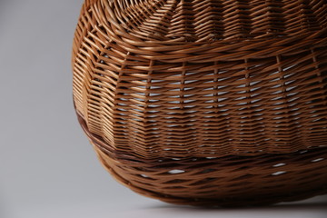 Fototapeta premium Wicker or wattle basket on a white background