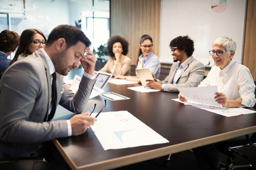 Successful group of business people at work in office