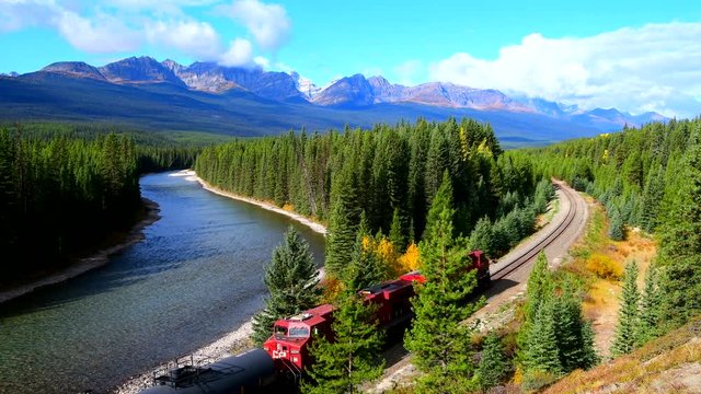 Train passing famous Morant's curve at Bow Valley in autumn ,Banff National Park, Canadian Rockies,Canada.