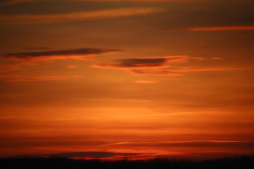 Sunrise over the  mediterranean sea with few clouds early in the morning