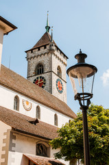 Fototapeta na wymiar Schaffhausen, St. Johann, Kirche, Kirchturm, Altstadt, Gassen, Strassenlaterne, Rhein, Ostschweiz, Sommer, Schweiz
