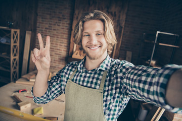 Self-portrait of his he nice attractive handsome cheerful cheery funny guy wearing checked shirt...