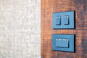 light switch on wooden Background
