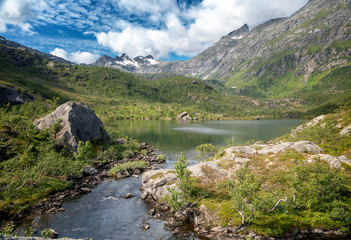 Naklejka na ściany i meble Beautiful Scandinavian landscape, mountains and a lake on the Vesteralen archipelago in Norway
