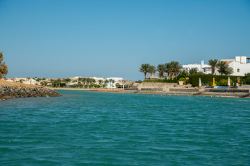 Venice Sands, Egypt. November 20 2018 Luxury villa by the sea with palm trees and a beach