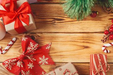 wrapped christmas gift boxes with ribbons on table