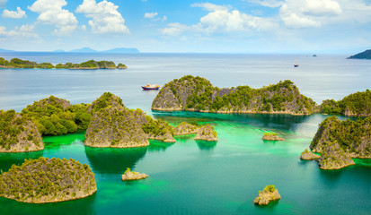 Picturesque lagoon with islands and turquoise calm water, panoramic
