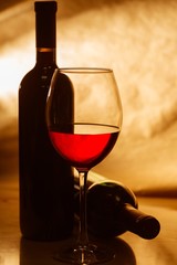 Red Wine Glass and Bottles