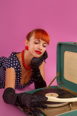 girl listening to a gramophone