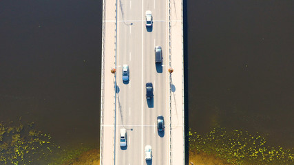 Aerial view drone shot of bridge with cars on bridge road image transportation background concept.