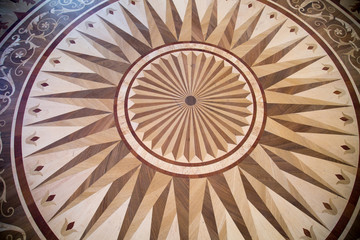 Background of parquet various wood pattern with circles radiating from the center. Backgrounds Structure Design.