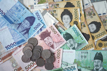 Korean won notes and Korean won coins for money concept background