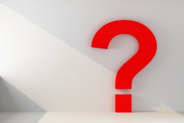 question mark on a wall with ray of light