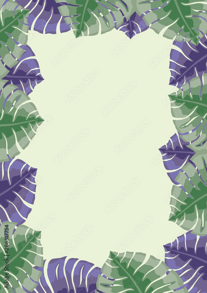 Wall mural frame of tropical leaves on a green background.