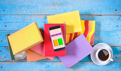 Stack of books and smartphone. online book shop, E- Book, book fair, reading,education concept....