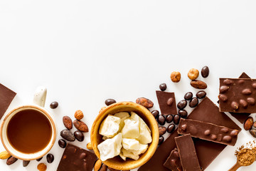 Cook homemade chocolate with bars, nuts, coffee beans on white background top view mock up