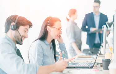 Team Business Operator in Office. Service Business, Call Center Team with Headset. The Center...