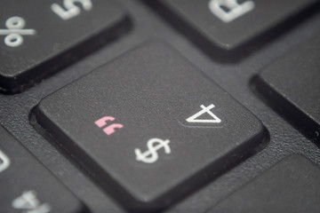Fototapeta premium Close up of the number 4 and dollar sign key on a keyboard