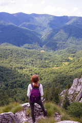 Naklejka premium girl on a rock