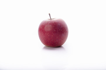 Fresh red apple isolated on white. With clipping path.