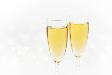 Sparkling New Year  background with champagne and stars. Christmas and happy new year 2020 concept..