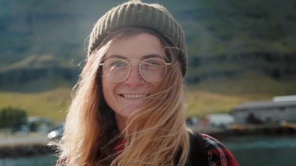 Portrait of beautiful travel woman in scandinavia