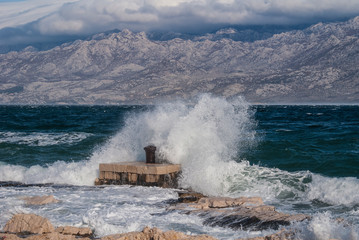 waves crashing on rocks